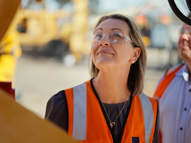 RME staff member looking up at a RUSSELL Mill Relining Machine