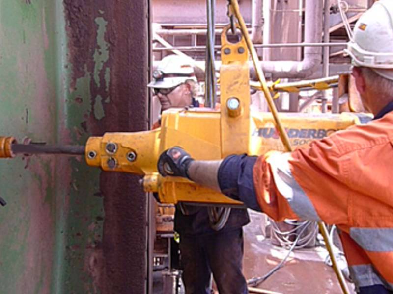 Mill Relining Crews Using a THUNDERBOLT 500 Recoilless Hammer